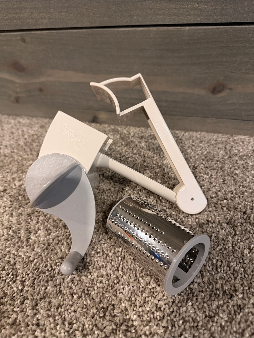 The Pampered Chef White Rotary Grater with Stainless Drum and Gray Handle Accent